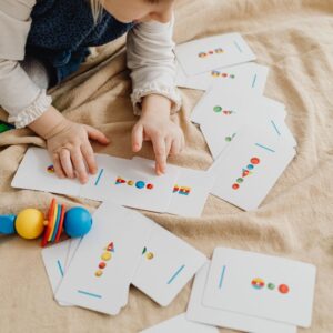 Child playing with cards